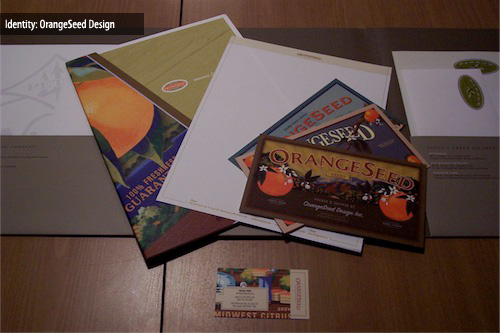 A design brief pocket folder, letterhead, 3 postcards and a business card.