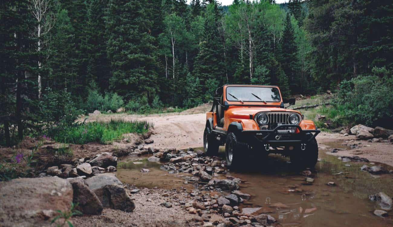 1984 Jeep CJ-7 Orange Lifted All Terrains AMC 360 V8